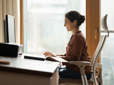 Young business lady working in modern home office